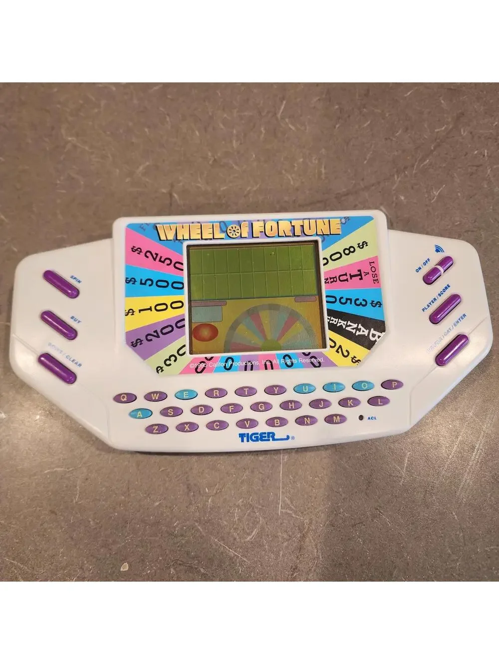Wheel of Fortune Handheld Electronic Game works perfect EUC condition booklet